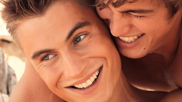 Handsome jocks jerking off together