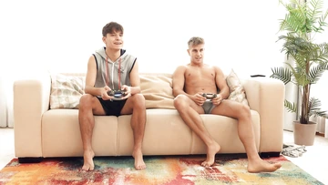 Guys on a sofa bareback fucks