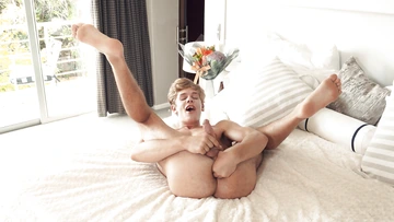 Wanking boy fingering himself