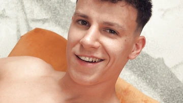 Muscular boy wanking and cums