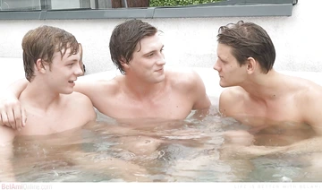 Three guys fucking on a sofa
