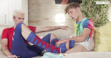 Gay boys fucking on a sofa