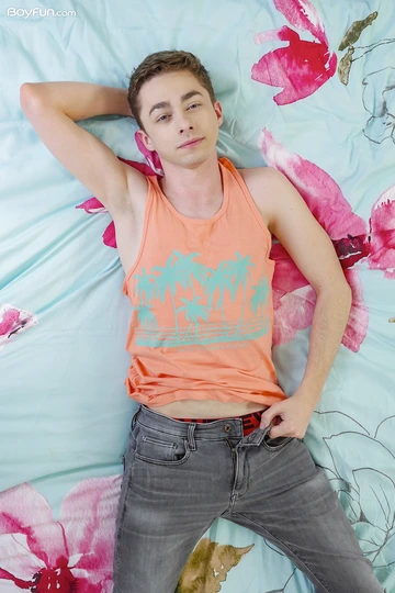 Boy with a long smooth shaved cock