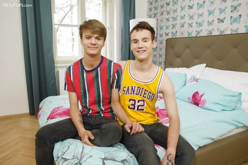 Boys in bed having bareback sex
