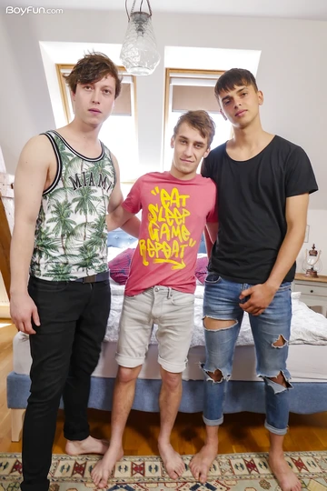 Boys in bed having a threesome
