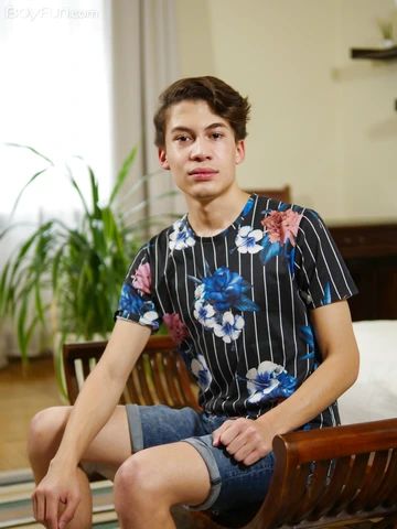 Cute boy with a curved cock