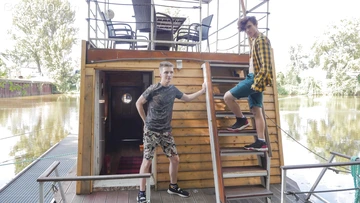 Two guys on a houseboat having sex