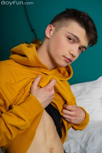 Cute boy with a shaved dick