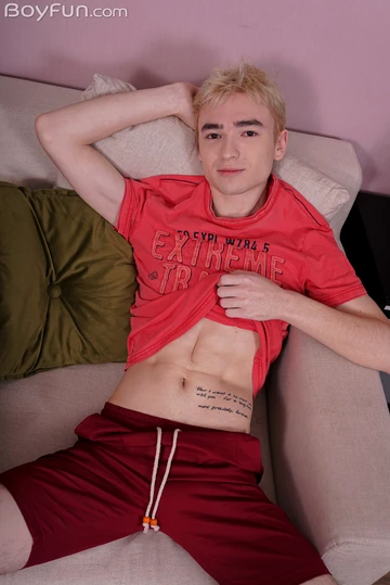 Pale blonde boy showing dick and ass