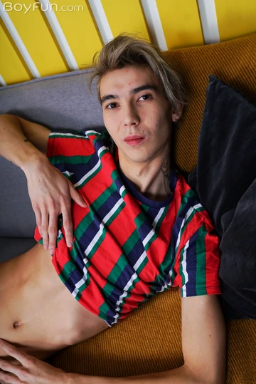 Skinny boy with a shaved dick