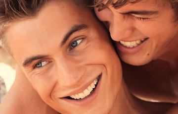 Handsome jocks jerking off together